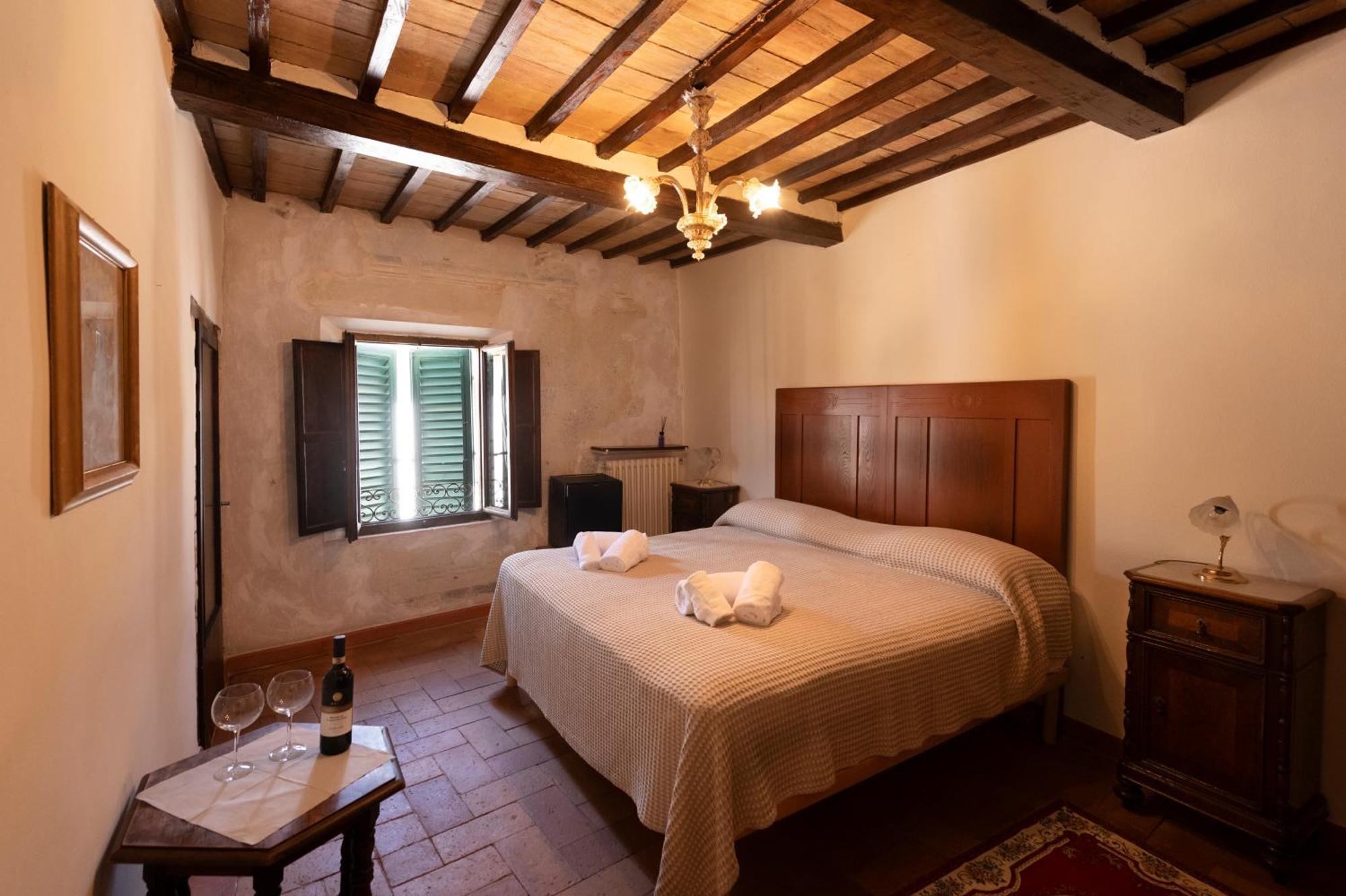 Bed and Breakfast Il Palazzo Del Cardinale Монтальчино Екстер'єр фото